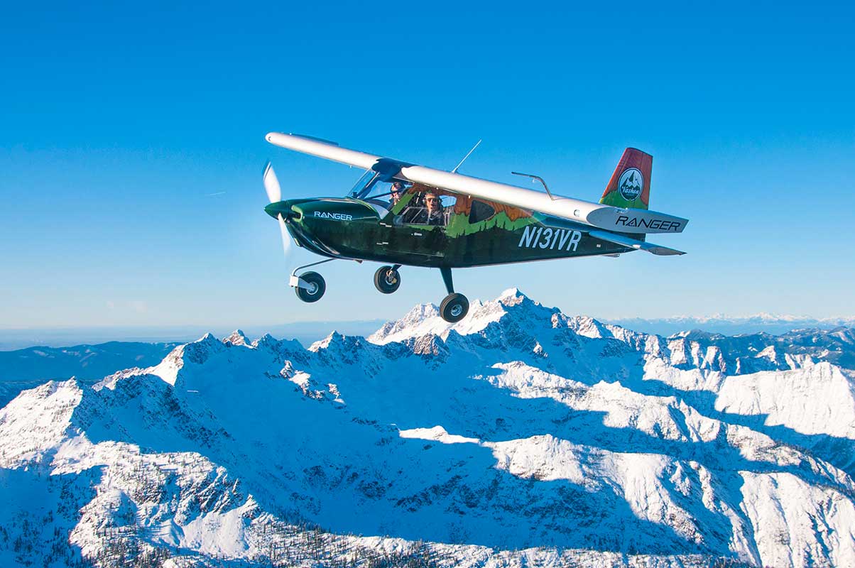 The S-LSA Ranger R7 flies around its home near Mt. Baker in Washington state